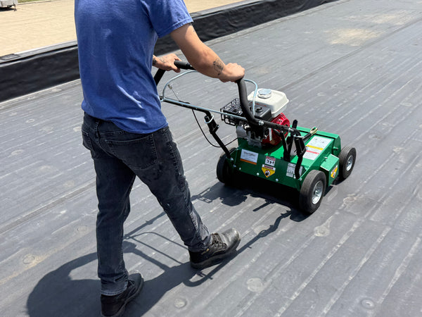 spray foam roof removal tool being used on a roof